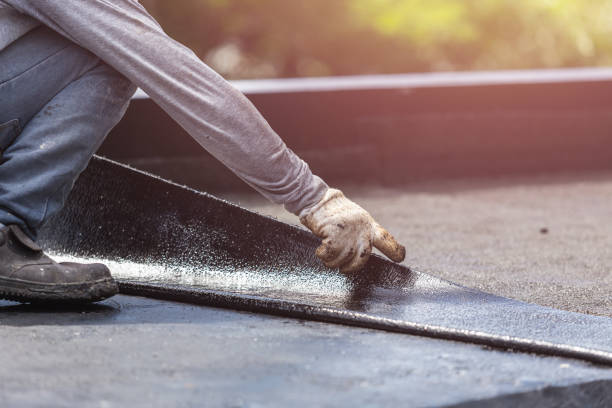Professional Basement Waterproofing technician working in Danville, PA